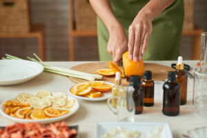 a chef using citrus oils in food prep